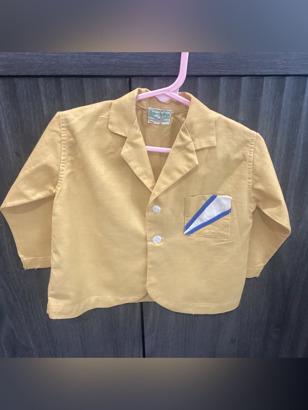 Vtg. Children’s Nautical set featuring a white vest with a flag and anchor